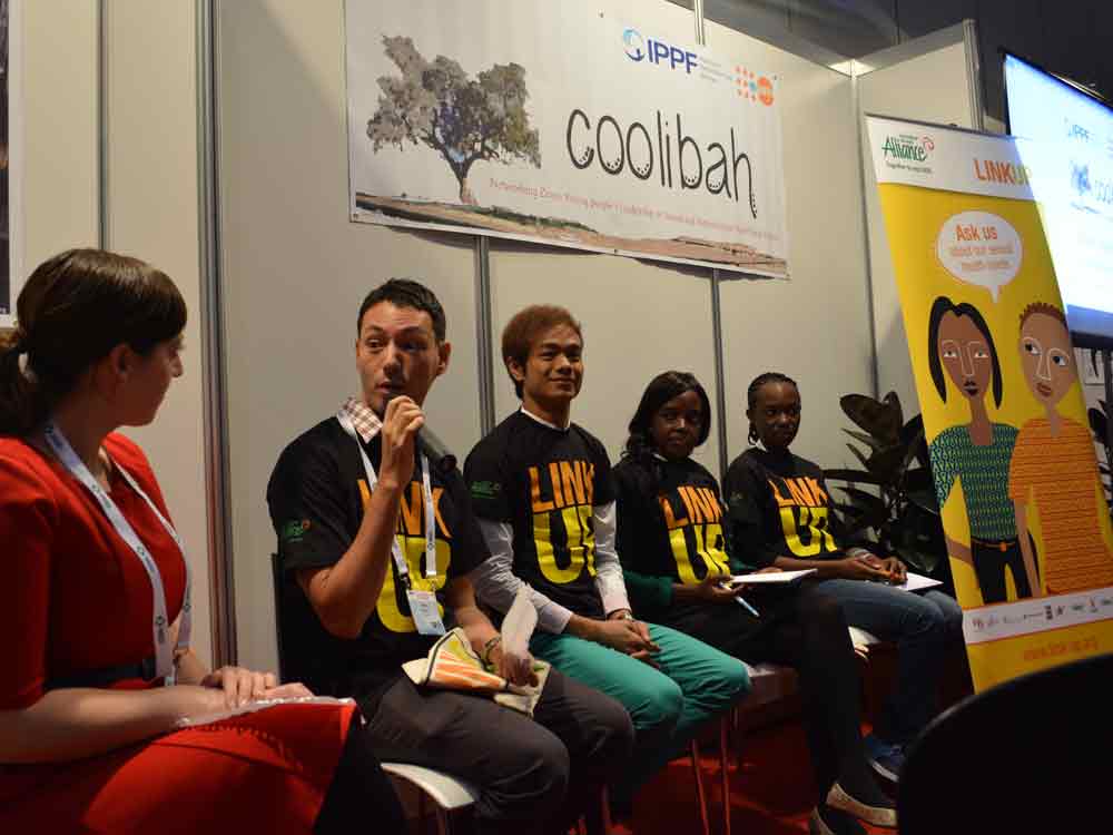 Link Up youth advocates during a panel discussion at AIDS 2014